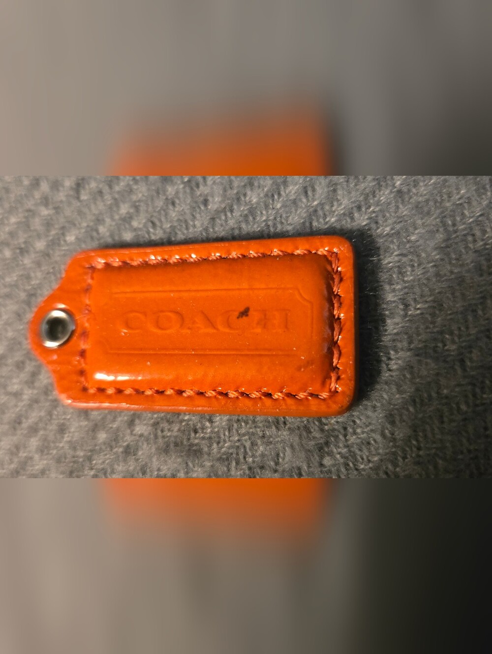 Coach Orange Patent Leather Tag